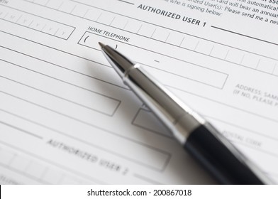 Blank Credit Application Form And Pen Close Up 