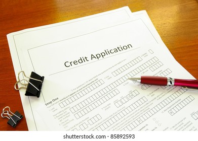 Blank Credit Application Form With Pen And Clips