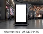 Blank digital signage screen in busy public area with people and festive decorations in background. Ideal for advertising, mockups or promotional displays in shopping mall or airport.