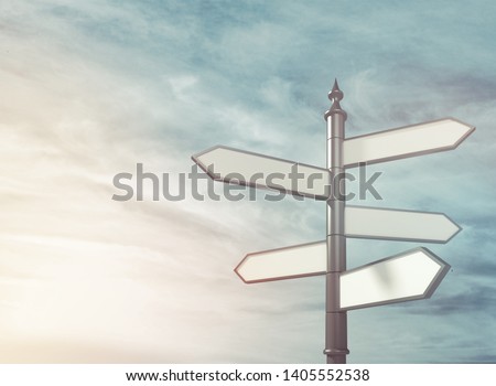 Blank directional sing road on the sky background