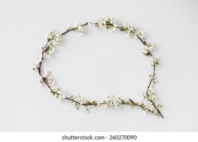 blank empty speech bubble made with white flowers - Powered by Shutterstock