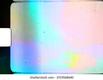 blank or empty super 8 film frame with cool scanning light interferences on the material.