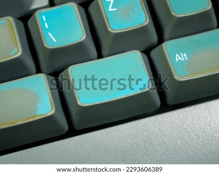 Blank empty unlabeled key on an old retro mechanical keyboard, object detail, macro, extreme closeup, unknown key template, symbol copy space, nobody. OS, operating system branding concept, empty key