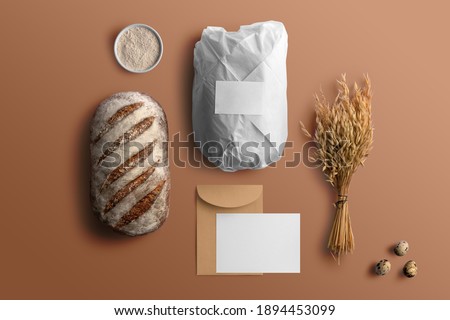 Blank envelope and card with bread, bakery branding mockup, empty space to display your logo or design.