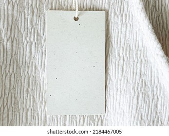 Blank Fashion Brand Label Tag, Sale Price Card On Luxury Fabric Background, Shopping And Retail Concept