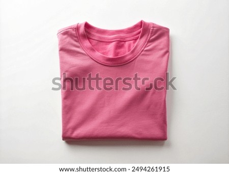 Blank fold t-shirt, Pink Blank Folded T-Shirt Mockup isolated on a White Background