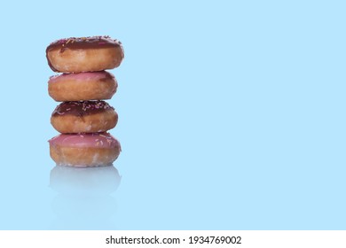 Blank Of Four Doughnuts On Blue Background