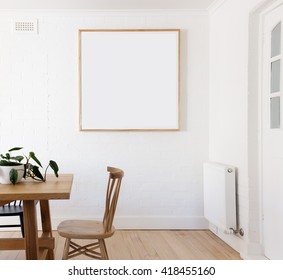 Blank Framed Print On White Wall In Beautiful Danish Styled Interior Dining Room