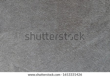 Blank generic seamless grey towel rug texture background