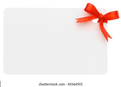 A Blank Gift Or Price Tag Tied With Red Ribbon Isolated On A White Background