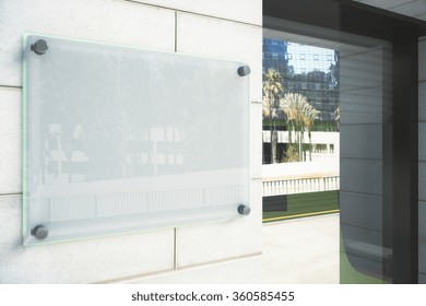 Blank glassy signboard on the wall outdoor, mock up