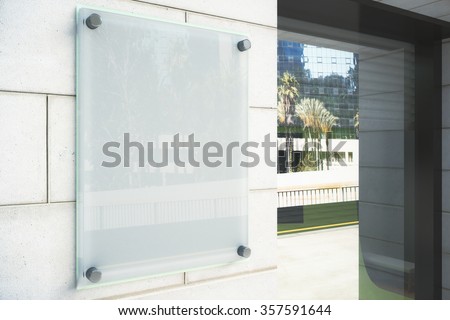 Blank glassy signboard on the wall outdoor, mock up