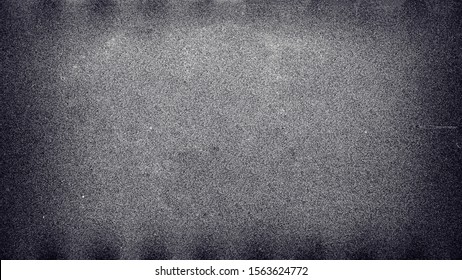 Blank Grained Film Strip Texture Background With Heavy Grain And Dust