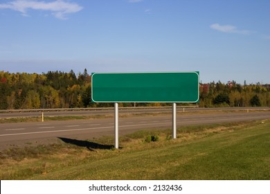 Blank Green Highway Sign In Autumn