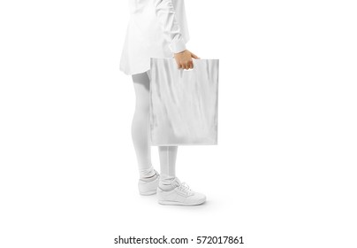 Blank Grey Plastic Bag Mockup Holding Hand. Woman Hold Gray Carrier Sac Mock Up. Plain Bagful Branding Template. Shopping Carry Package In Persons Arm. Promotional Packet For Logotype Branding.