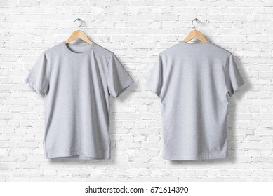 Blank Grey T-Shirts Mock-up hanging on white wall, front and rear side view . Ready to replace your design