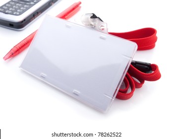 Blank ID Card Holder Isolated On White, With Red Pen And Cell Phone.