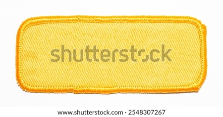 Blank isolated gold rectangular patch with gold trim.