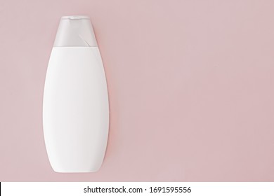 Blank Label Shampoo Bottle Or Shower Gel On Pink Background, Beauty Product And Body Care Cosmetics, Flatlay