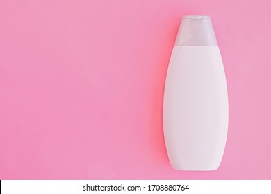 Blank Label Shampoo Bottle Or Shower Gel On Pink Background, Beauty Product And Body Care Cosmetics, Flatlay