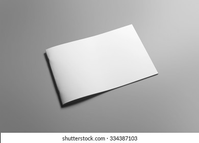 Blank landscape brochure magazine isolated on cardboard background, with clipping path, changeable background
 - Shutterstock ID 334387103