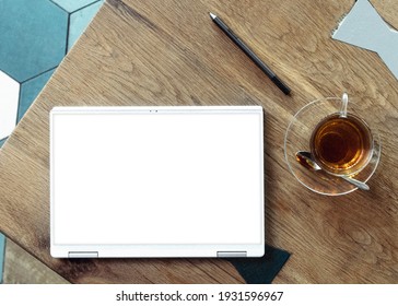 Blank Laptop, Tablet Screen On Wooden Table, Dell XPS Laptop Blank Screen Mockup And Template Signboard For Text Message Or Media And Content