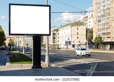 Blank large billboard in a residential area of the city. Mock-up. - Shutterstock ID 2125273082