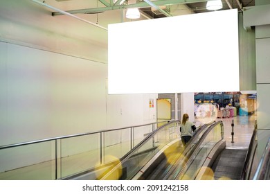 Blank Large Horizontal Poster In Public Places. A Mockup Billboard Near Escalator In Airport Building, Office Building Or Subway Station. 3D Display.