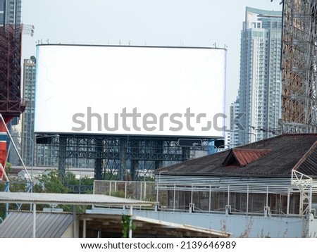 blank LED bilboard on tower and on city urband background