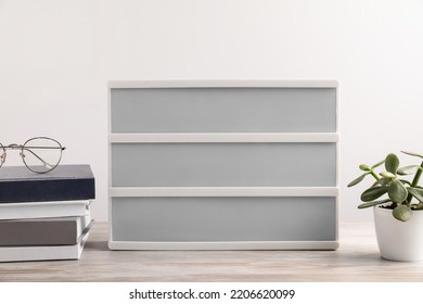 Blank Letter Board, Books, Glasses And Beautiful Houseplant On Wooden Table. Mockup For Design