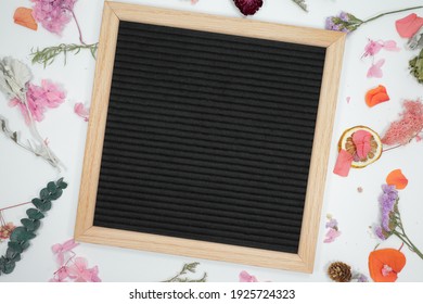 Blank Letter Board With Flowers On White Background