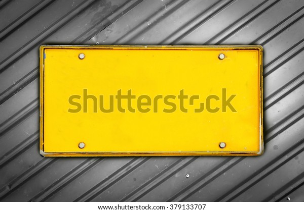 blank license plate on metal\
sheet