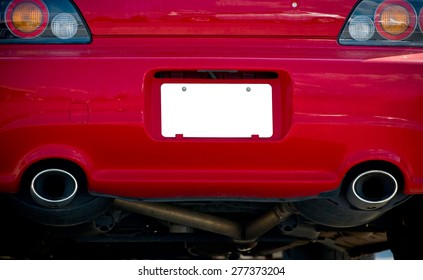 Blank License Plate On Red Car