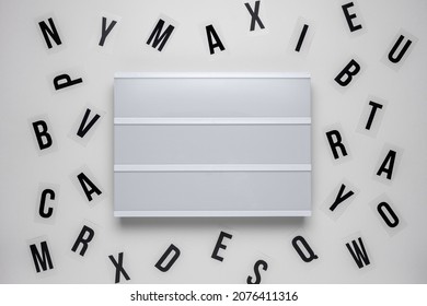 Blank Lightbox With Letters Over White Background.