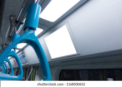 A Blank Lighted Signboard Inside A High Speed Train, With Space For Text.