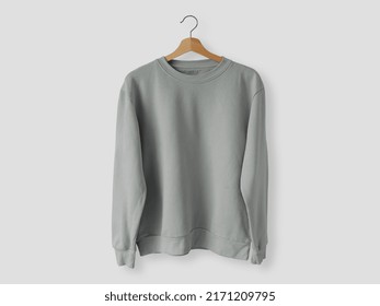 Blank long sleeve shirt hanging on the wall mock up template