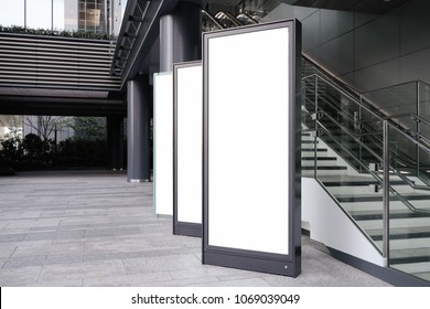 Blank Mall And Shop Advertising Shelter And Board On Road.