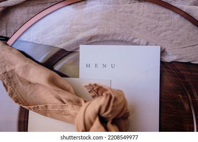 Blank Menu Card Resting On Glass Plate On Table Decorated With Autumn Colours And Pastel Tones