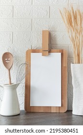 Blank For Menu Or Recipe, Kitchen Background With Chud And White Sheet On Wooden Cutting Board, Free Space For Text