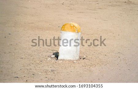 Blank Milestone or kelometre stone on road side