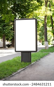 Blank mock up of vertical street poster billboard on city background, Billboard, banner, empty, white at a bus stop, Blank street billboard poster stand mock up on city business district background.