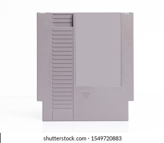 A blank for mockup retro vintage nintendo entertainment system NES console game cartridge isolated on a white background. iconic 1980s video game history and collectables. - Shutterstock ID 1549720883