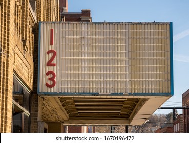 Blank Movie Cinema Billboard Or Marquee Sign In Typical USA High Street In Downtown City