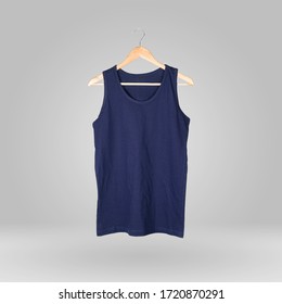 Blank Navy Blue Tank Top Shirt Mock-up On Wooden Hanger For Man