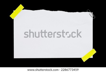 Blank note paper with yellow tape edge
