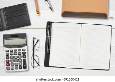 Blank Notebook Or Diary And Pocket Card With Calculator And Eyeglasses For Stationery On Top View White Wood Table Or Desk For Your Note Or Put Card In The Wallet