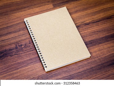 Blank Notebook Mock Up On Wood Background