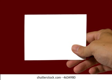 Blank notecard on red background with copy space