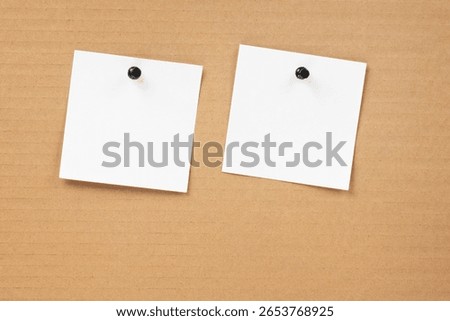 Blank notepaper and space for text with push pins on cardboard background. note blank paper cards. noticeboard on catron board. sticker. blanks for designers