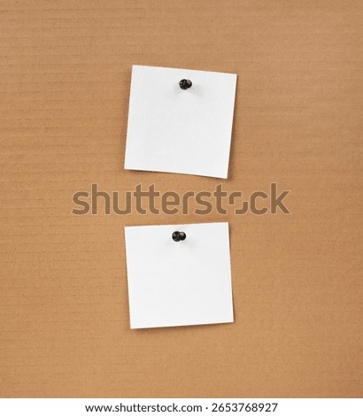 Blank notepaper and space for text with push pins on cardboard background. note blank paper cards. noticeboard on catron board. sticker. blanks for designers